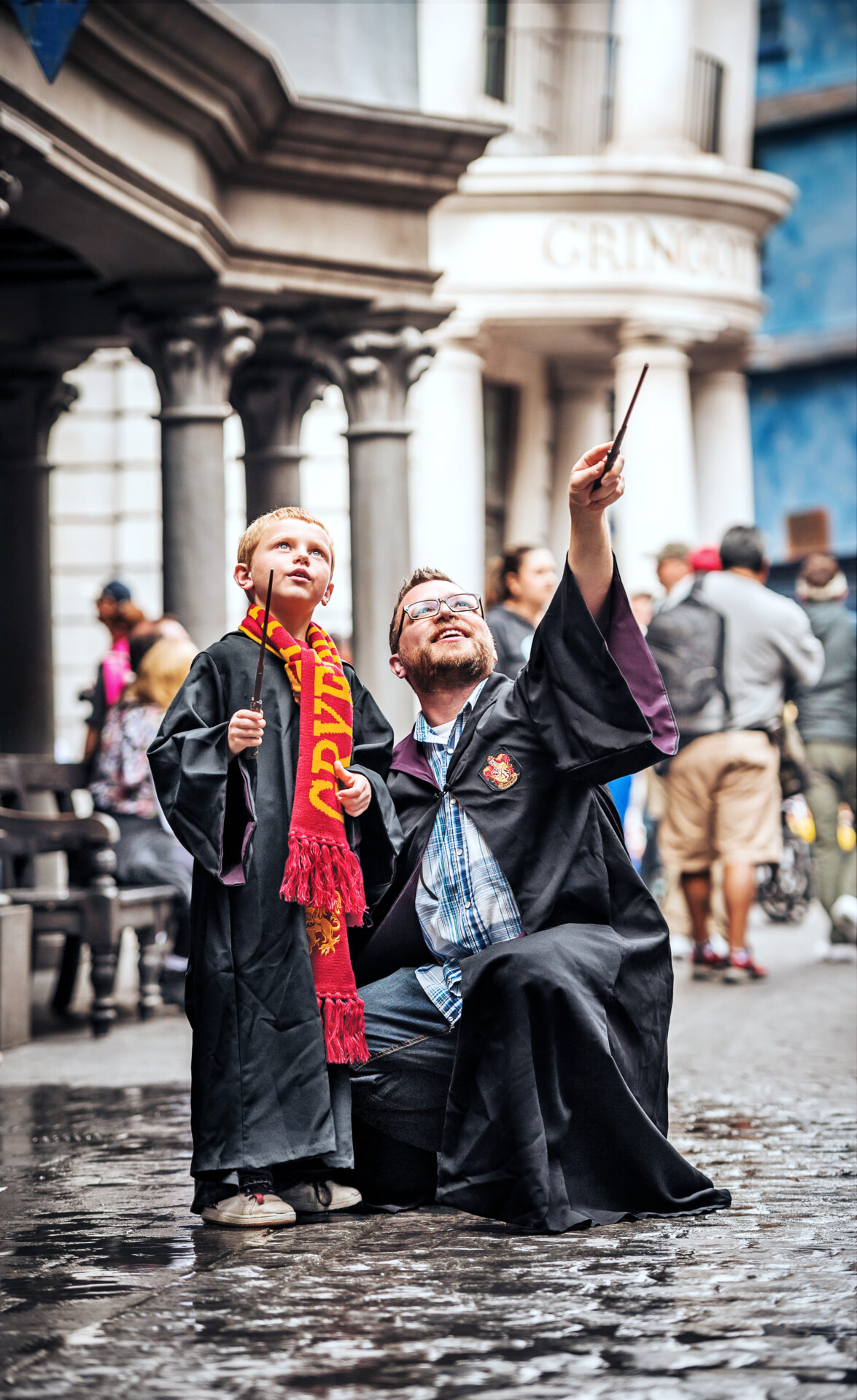 Universal Studios Florida USF Diagon Alley, interactive wands, families arrive, drinking Butterbeer, Exteriors Daytime